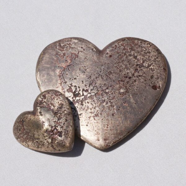 Hand cast hearts in bronze by JJ Walker from the Soul searching limited edition sculpture